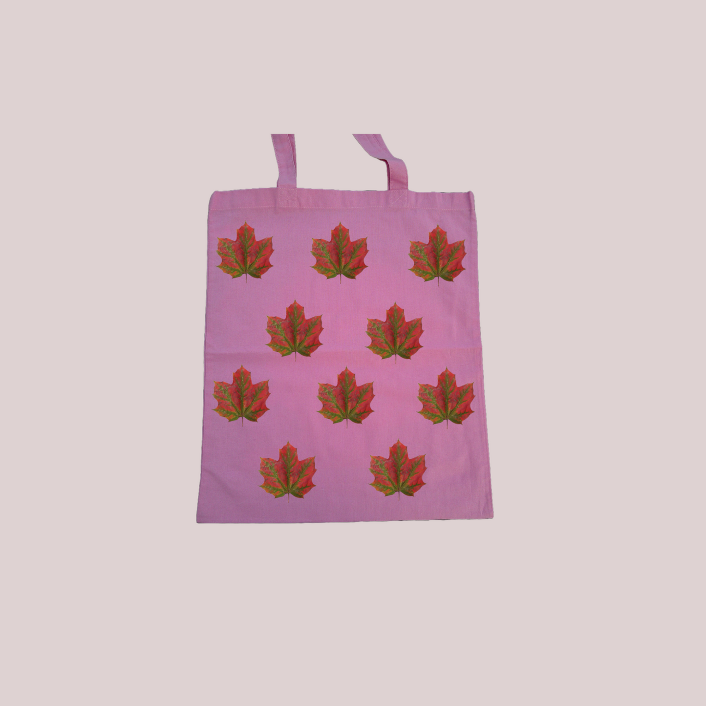 Red and green leaf print tote bag