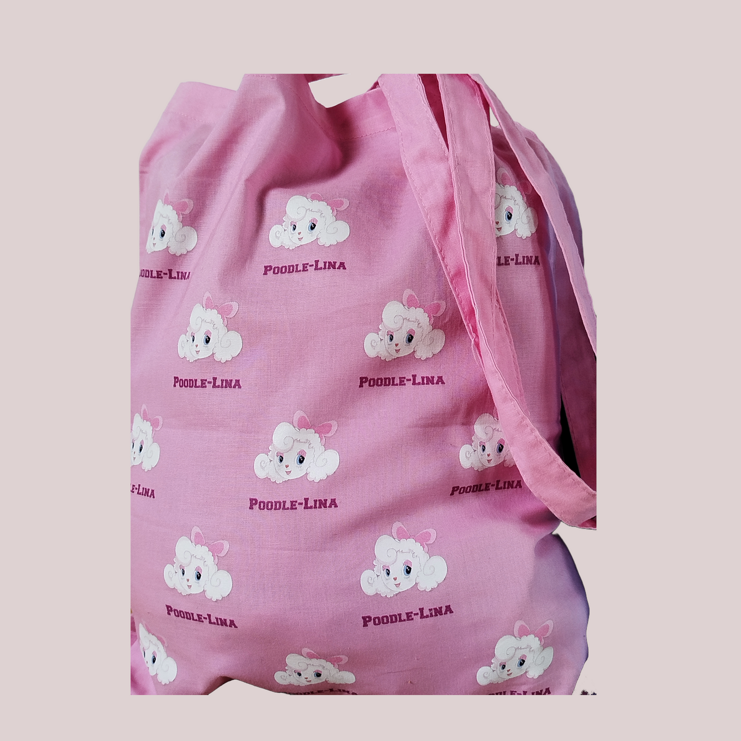 Pink, cotton tote bag with cartoon poodle design printed all over