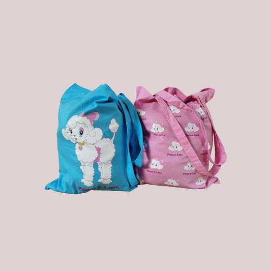 Two 100% cotton tote bags, one blue and one pink, with a cartoon poodle design.