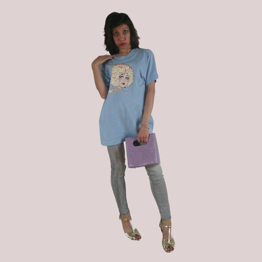 A chic handbag and casual T-shirt
