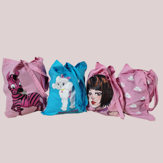 Four colorful cotton shopper bags with different cartoon designs for sale 