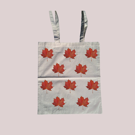 Red leaf print tote bag