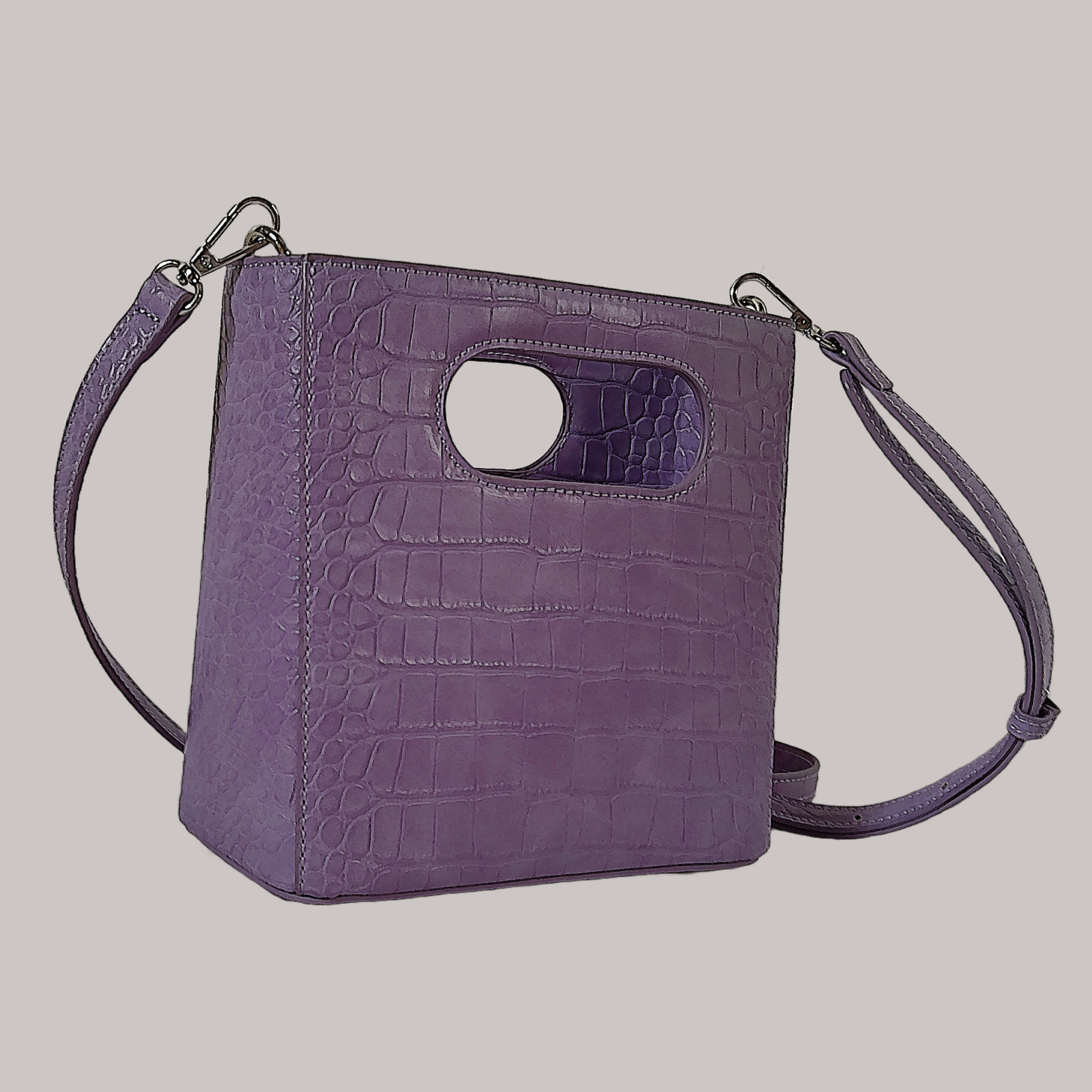 Square shaped light purple women's hand bag with removable and adjustable strap