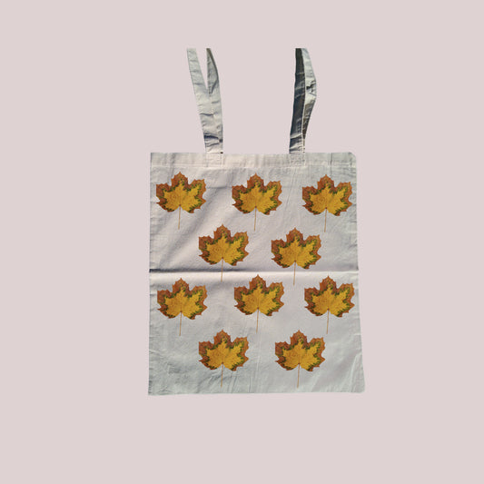 Yellow leaf all over print tote bag